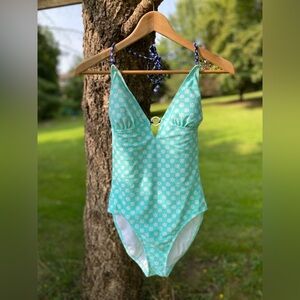 OLD NAVY one piece swimsuit; teal/white flowers; size small. Great condition.
